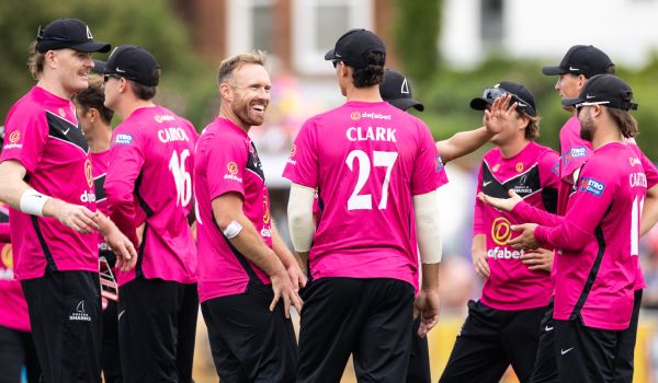 Sussex players celebrate after taking a wicket against Somerset