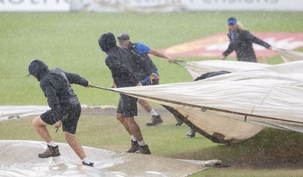 The Grounds Team hard at work on a wet and windy Day 4