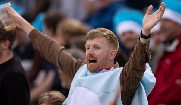 Sharks fan celebrates a wicket at hove