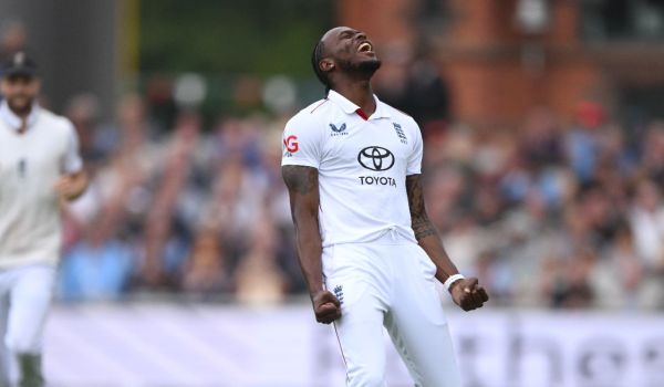 Jofra Archer celebrates the wicket of Ravindra Jadeja during day two of the Fourth Test Match between England and India at Emirates Old Trafford