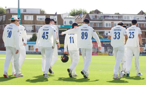 Sussex players walking onto the pitch at Hove