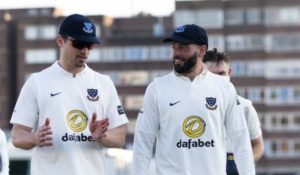 Sussex players head off the field
