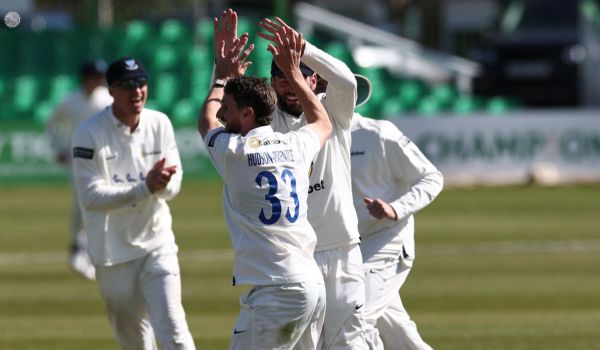 Fynn Hudson-Prentice celebrates a wicket.