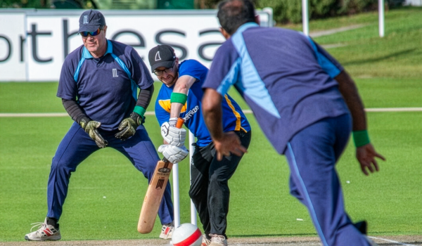 bcew-player-hitting-ball