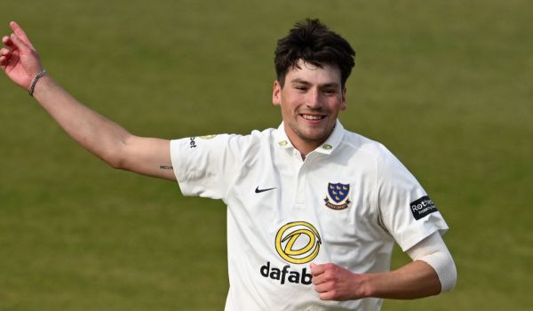 Henry Crocombe celebrates a wicket.