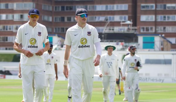 Sussex players walking off the pitch