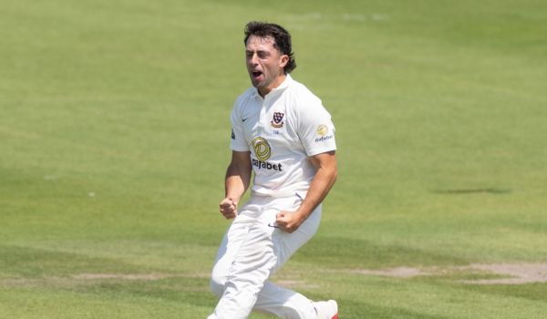 Tom Haines celebrates a wicket.