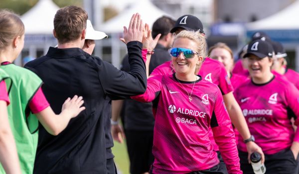 Chiara Green celebrates with the rest of her teammates