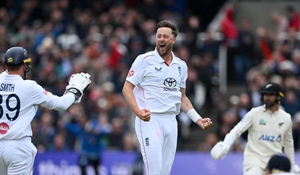 Ollie Robinson celebrating a wicekt for England.
