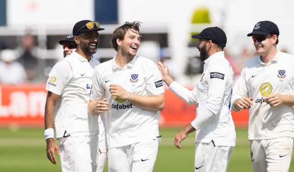 Sussex players celebrate a wicket