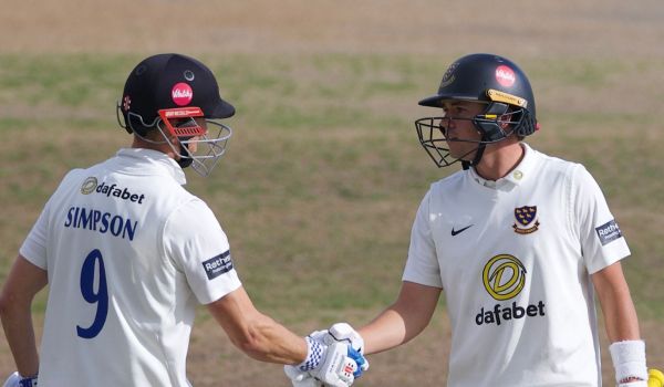 Simpson congratulates Tear on a fine knock