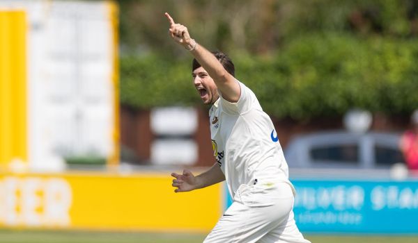 James Coles celebrates a wicket