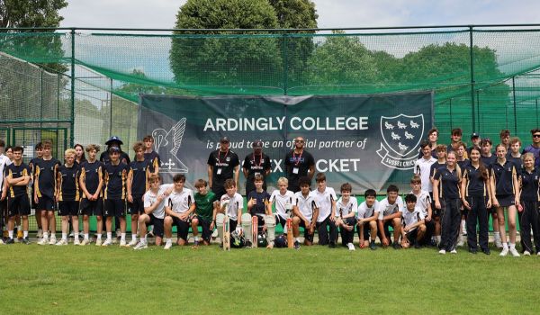 A group photo outside the nets at Ardingly College.