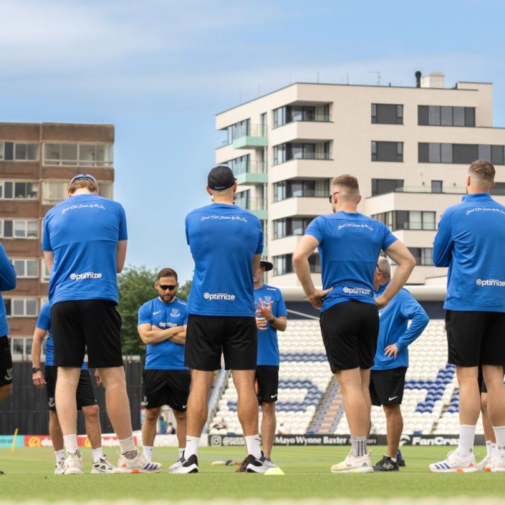 Sussex men's team in a huddle at hove before a game