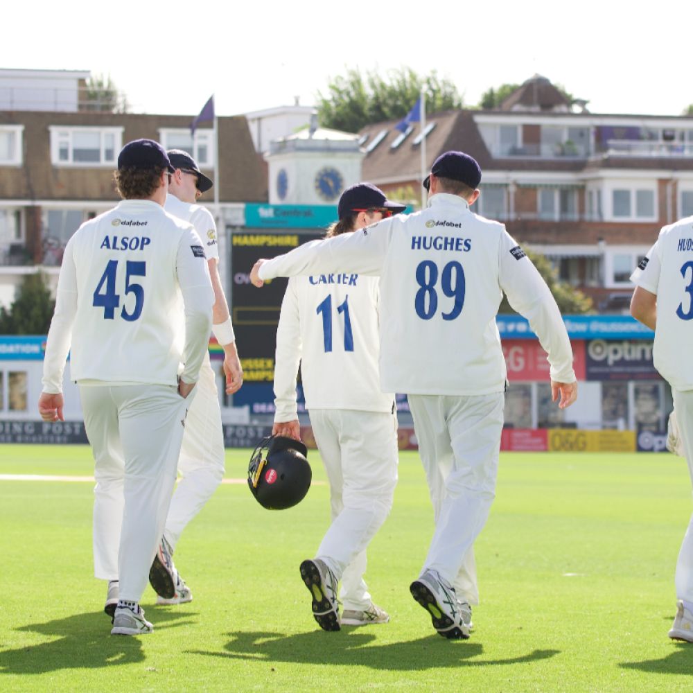 Sussex players walking onto the pitch at Hove